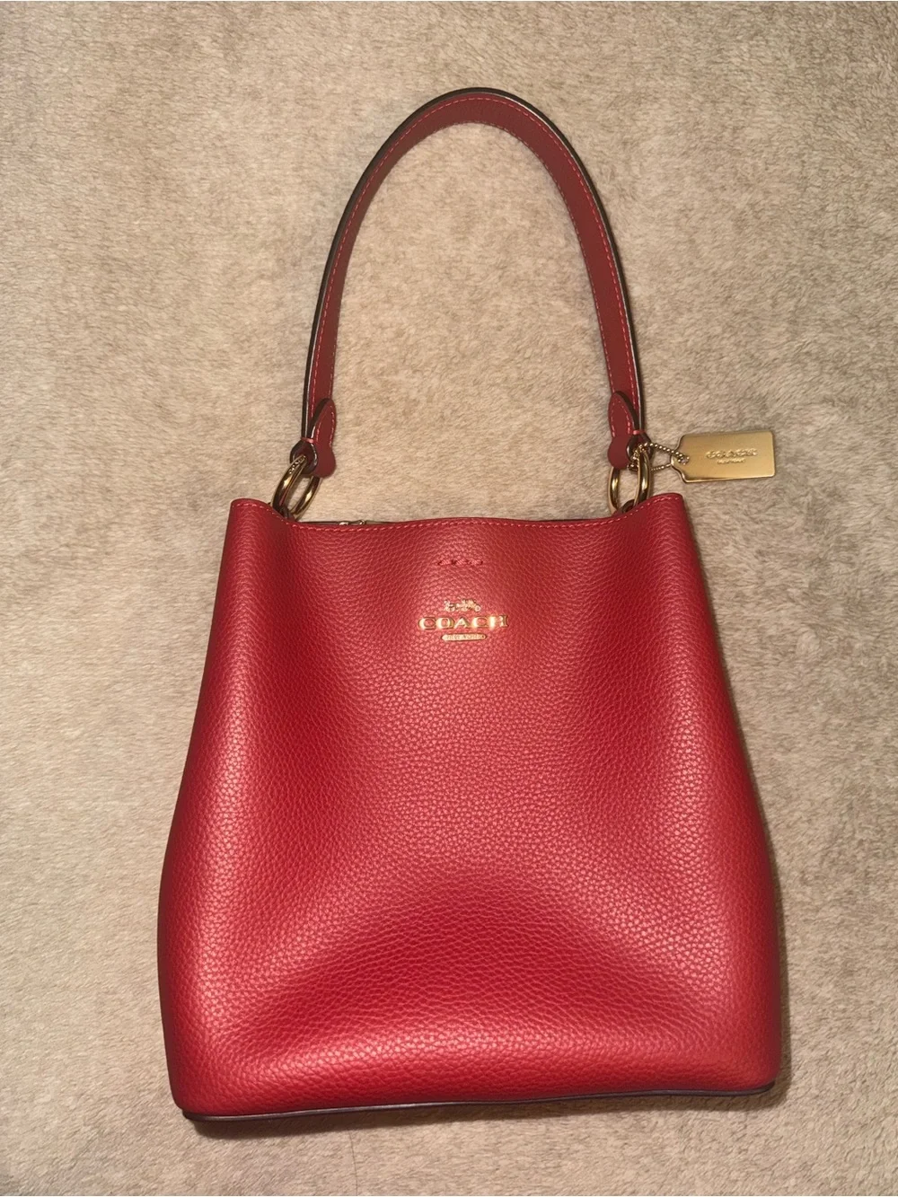 Coach Red Pebbled Leather Shoulder Tote with Gold Hardware Strap not included.